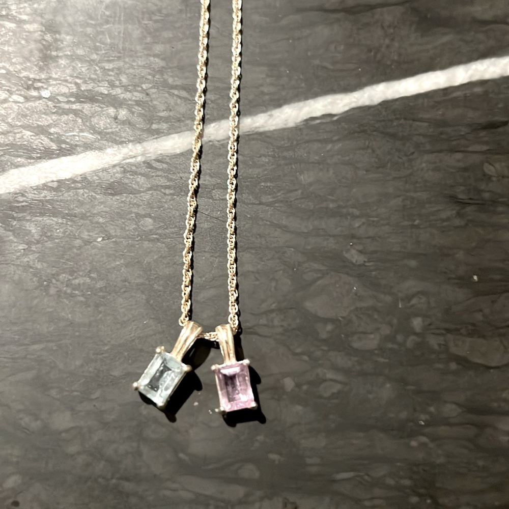 Sterling silver 18” French rope chain necklace with pink and blue stones.